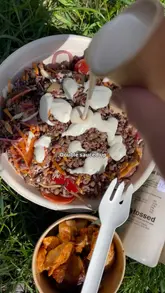 Here are a few options for your alt text, keeping it descriptive and SEO-friendly:

**Option 1 (Descriptive & SEO focused):**
Gluten-free salad bowl from Tossed UK, a coeliac-friendly fast food lunch option for people with dietary restrictions.

**Option 2 (Action-oriented):**
A fresh, nutritious gluten-free salad bowl from Tossed UK, perfect for a safe and delicious quick lunch on the go.

**Option 3 (Concise):**
Healthy, gluten-free salad bowl from Tossed UK, a top choice for coeliac-friendly fast food on the high street. 

**Tip:** I recommend **Option 1** as it hits the key search terms ("Gluten-free," "Tossed UK," "coeliac-friendly," and "fast food") while staying under the character limit.