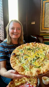 A fast-paced, engaging review of Short Road Pizza's residency at the William the Fourth pub in East London. The video features the creator trying various dishes, including chicken bites and unique pizza toppings, while highlighting the pub's atmosphere.