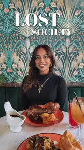 A video showcasing a Sunday roast experience at Lost Society, featuring cocktails, the venue interior, and a lamb shank roast dinner.