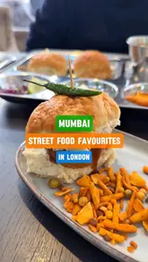 A review of Mumbai street food dishes at 'It's Thecha' in London, featuring the creators trying various items like Misal Pav, Vada Pav, Jini Dosa, and Ragda Pattice.