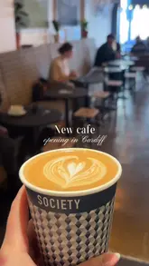A vlog-style reel showcasing the opening of a new Society Cafe location in Cardiff, highlighting the interior, coffee, pastries, and merchandise.
