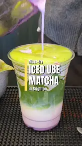 Here are a few options for your alt text (all under 125 characters):

**Option 1 (Descriptive):**
Iced Ube Matcha and warm coconut matcha served at Neeko Cafe in Brighton.

**Option 2 (Action-oriented):**
Close-up of a vibrant purple Ube iced matcha and a warm coconut matcha on a table at Neeko Cafe.

**Option 3 (SEO-focused):**
Delicious Ube iced matcha and warm coconut matcha drinks at Neeko Cafe, Brighton.

**Recommendation:** Use **Option 1** or **Option 2** as they describe the visual content best for accessibility while including the relevant location and brand keywords.