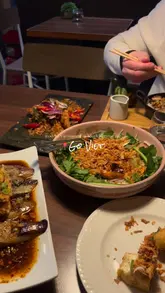 A montage showcasing various Vietnamese dishes at Go Viet in South Kensington, including grilled aubergine, crispy beancurd, and pork rice.