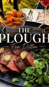 A montage video showcasing the renovated Plough pub in Fen Ditton, highlighting its outdoor garden, riverside setting, pizza oven, and a selection of pub classics including steak and dessert.