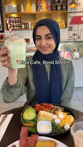 A review of Kula Cafe in London, featuring a variety of brunch options including a full English and a vegetarian breakfast. The creator highlights the halal menu, the quality of the food, and the service, while noting some inconsistencies between the menu photos and the actual presentation.