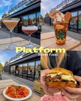 Here are a few options for your SEO alt text, all under 125 characters:

**Option 1 (Descriptive & SEO-focused):**
A variety of dishes including pasta, burgers, and cocktails served at Platform Street Food in Cardiff Bay.

**Option 2 (Action-oriented):**
Diverse food and cocktails from independent vendors at the new Platform Street Food hall in Cardiff Bay.

**Option 3 (Concise):**
Table full of gourmet burgers, pasta, and desserts at Platform Street Food, Cardiff Bay.

**SEO Tip:** Including "Cardiff Bay" and "Street Food" are your strongest keywords for local search rankings!
