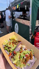 A fast-paced, handheld-style video showcasing 'The Tacover' food festival in Southampton. The reel features a variety of taco vendors, including birria and unique fusion options, alongside cocktails and live entertainment like traditional Mexican dancers. It captures the lively, social atmosphere of the event.