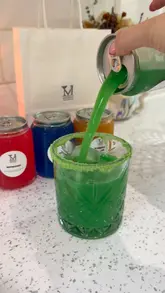 A promotional video for a mobile cocktail delivery service, showcasing the preparation and pouring of various pre-mixed cocktails into glasses.