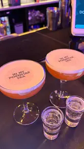A fast-paced montage showcasing a visit to Boom Battle Bar, featuring augmented darts, arcade basketball, cocktails, and street food. The video captures the energetic atmosphere of the venue, highlighting the combination of competitive socialising and casual dining.