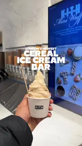 Here are a few options for your SEO alt text (all under 125 characters):

**Option 1 (Focus on location and product):**
A custom cereal-infused ice cream swirl with cookie dough toppings at the new Kith Treats shop on Regent Street, London.

**Option 2 (Action-oriented):**
A close-up of a delicious, custom cereal ice cream treat being served at Kith Treats in Central London.

**Option 3 (Concise):**
Custom cereal-infused ice cream in a swirl at the new Kith Treats flagship store on Regent Street, London.