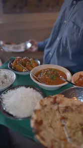 A promotional reel for a newly opened Indian restaurant in Peterborough, featuring the chef explaining their modern approach to Indian cuisine, showcasing the kitchen, and presenting a variety of dishes.