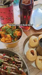 A short, energetic montage showcasing a visit to Zindiya in Birmingham, highlighting a variety of Indian street food dishes like pani puri, chilli paneer, and lamb chops, alongside the restaurant's vibrant, authentic interior decor.