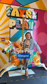 A family-focused vlog showcasing Fayre Play in Glasgow, highlighting the various arcade-style games and the fun, competitive atmosphere suitable for families and friends.