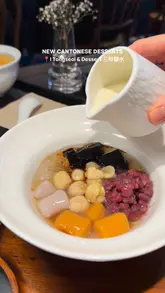 Here are a few options for your SEO alt text, depending on what is most prominent in the image:

**Option 1 (Focus on the desserts):**
"Assorted Cantonese desserts including mango pomelo sago and black sesame mochi at I Tongseoi in Birmingham."

**Option 2 (Focus on the brand/location):**
"I Tongseoi & Dessert in Birmingham Chinese Quarter serving new summer Cantonese desserts and signature feasts."

**Option 3 (Concise & descriptive):**
"Table spread of Cantonese mango pomelo sago and handmade rice mochi at I Tongseoi dessert shop in Birmingham."

**SEO Tip:** Option 1 is generally the strongest for SEO because it includes the specific dish names (keywords) that people are likely to search for when looking for dessert spots.