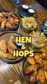 A vlog-style review of Hen & Hops in Newcastle, showcasing their extensive wing menu, local beers, and casual dining atmosphere.