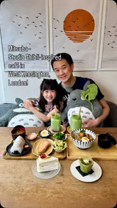 A family-focused vlog showcasing a Japanese cafe in West Kensington, highlighting its Studio Ghibli-inspired decor, tatami seating, and a variety of Japanese dishes and matcha-based drinks.