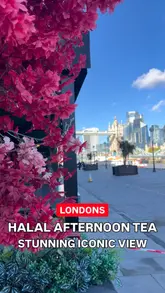 A promotional video showcasing an afternoon tea service at Coco, a venue in London with views of Tower Bridge. The video features shots of the interior, the afternoon tea spread including sliders, halloumi, and pastries, and the iconic view.