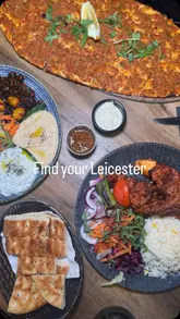 Here are a few options for your SEO alt text (all under 125 characters):

**Option 1 (Descriptive & SEO focused):**
Friends enjoying a foodie evening out at a restaurant in Leicester after taking the First Bus.

**Option 2 (Action & Brand focused):**
A group of friends dining at a Leicester restaurant after traveling on a First Bus service.

**Option 3 (Concise):**
People eating dinner together at a Leicester restaurant using the First Bus Flexi ticket for travel.

**SEO Tip:** I recommend **Option 1** as it hits the keywords "foodie evening," "Leicester," and "First Bus" naturally.