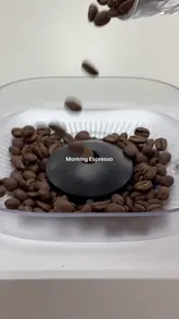 A short, aesthetic product demonstration video showcasing the Philips Baristina coffee machine, focusing on the process of making an espresso from bean to cup.