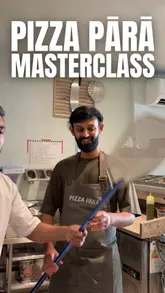 A short, handheld-style video showcasing a pizza-making masterclass at Pizza Pärä. The video follows the process of preparing the dough, adding sauce and toppings, and the final cooked pizza, highlighting the interactive nature of the experience.