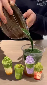 A series of close-up shots demonstrating the preparation of various matcha-based drinks, including pouring matcha, adding fruit layers, and topping with whipped cream.