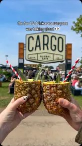 The video is a montage of clips from the 'CARGO Global Eats' area at the Badminton Horse Trials. It showcases various food and drink options, including burgers, steak sandwiches, cocktails in pineapples, and churros, alongside the seating area and the event atmosphere.