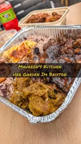 Here are a few options for your SEO alt text, keeping it under 125 characters:

**Option 1 (Descriptive):**
A delicious spread of authentic Jamaican food including jerk chicken and rice at Maureen’s Kitchen in Brixton, London.

**Option 2 (Focus on keywords):**
Authentic Caribbean meal at Maureen’s Kitchen in Brixton, widely considered the best Jamaican food in London.

**Option 3 (Concise):**
Platter of traditional Jamaican Caribbean cuisine served at the popular Maureen’s Kitchen in Brixton, London.

**SEO Tip:** Since alt text is used for accessibility and search engines, it is best to include the **business name**, **location**, and **type of cuisine**, as done in the options above.