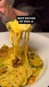 A short, fast-paced video review of Casa Felicia, an Italian restaurant in Queen's Park, London. The video features close-up shots of various pasta dishes, bread, and cocktails, interspersed with brief glimpses of the restaurant's interior and atmosphere. The text overlay highlights the quality of the food and the unique selling point of a daily changing menu.