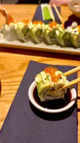 Here are a few options for your SEO alt text (all under 125 characters):

**Option 1 (Descriptive & SEO-focused):**
A delicious spread of Japanese food including sushi rolls, tuna nigiri, and chicken katsu at Yakitori 1 in Cardiff Bay.

**Option 2 (Action-oriented):**
Freshly prepared Japanese dishes including dragon rolls and chicken katsu served at Yakitori 1 restaurant in Cardiff Bay.

**Option 3 (Short & punchy):**
Selection of sushi, nigiri, and chicken katsu served at Yakitori 1, a Japanese restaurant in Mermaid Quay, Cardiff Bay.