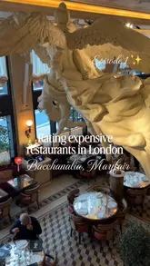 A short, visually-driven review of Bacchanalia in Mayfair, London. The video showcases the restaurant's extravagant, museum-like interior, featuring large statues and ornate decor. It highlights the set menu, various dishes including salmon and cauliflower, and cocktails, while providing a brief, honest critique of the food quality versus the ambiance.