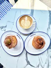 Your Coffee & Cruffin fix! ➡️

@richouxrestaurants new cruffin range is everything you want — buttery laminated layers baked to golden perfection, topped with silky cream and filled with indulgent flavours.

✨ Salted Caramel 🍫 Chocolate 💚 Pistachio

Each one is crisp on the outside, soft and airy in the centre, with rich creamy fillings that make every bite feel extra decadent. Paired with an oat flat white, it’s the perfect excuse to slow down, people watch, and soak up a summer day in London. 

INVITE