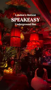A short, atmospheric montage showcasing the interior and cocktail offerings of Zum Barbarossa, a speakeasy bar in Soho, London. The video highlights the venue's distinctive red lighting, intimate seating, live DJ, and cocktail menu.