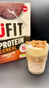 [PR | Gifted]

Mornings lately have felt like a full-on sprint 😅 Between getting out the door, juggling work and everything in between, breakfast can easily become an afterthought… so having easy options that actually taste good has been a game changer ✨

I’ve been trying out the new @ufitdrinks cereal range 🤎🥣

I received the Honey & Oat Granola and the Chocolate Hoops, and they’ve been such a fun switch-up to my usual breakfast routine 🙌

First up… I made an incredible homemade cereal milk latte topped with cold foam and finished with Chocolate Hoops 🍫☕️ It genuinely tasted like a coffee shop treat at home.

Then of course I had to keep it classic with a simple bowl of cereal because sometimes you just can’t beat the nostalgic favourites 🥛✨

And my favourite combo? A fruit granola bowl using the Honey & Oat Granola as the base, topped with coconut yoghurt, sliced banana, strawberries and blueberries 🍓🫐🍌 the granola is super crunchy and actually tastes great!! 

What I love about UFIT is that they’ve created breakfast options that are quick, convenient and genuinely delicious for real everyday life 💛

You can shop the range directly on the UFIT website or find it in Tesco and Morrisons 🛒✨