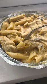 Here are a few options for your SEO alt text, keeping it under 125 characters:

**Option 1 (Descriptive & SEO-friendly):**
Creamy chicken and mushroom pasta dish from Ques Pizzas in Herrington, North East England.

**Option 2 (Action-oriented):**
Close-up of a delicious creamy chicken pasta dish served at Ques Pizzas in Herrington.

**Option 3 (Simple & punchy):**
A bowl of creamy chicken and mushroom pasta from the menu at Ques Pizzas, Herrington. 

**SEO Tip:** Always include the location (Herrington) and the brand name (Ques Pizzas) to help local searchers find your post!