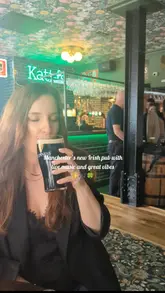 A short, energetic video showcasing a visit to Katie O'Brien's, a new Irish pub in Manchester. The footage highlights the lively atmosphere, live music, and the range of drinks on offer, including Guinness and Baby Guinness shots.