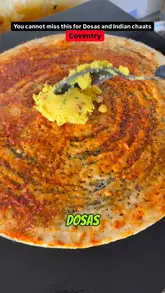 Here are a few options for your alt text, keeping it under 125 characters and optimized for SEO:

**Option 1 (Descriptive & SEO focused):**
Crispy dosa and flavorful Indian street food served at ChaatsGPT in Coventry city centre.

**Option 2 (Action-oriented):**
Freshly prepared Indian street food and crispy dosas at ChaatsGPT, a popular dining spot in Coventry.

**Option 3 (Concise):**
Delicious Indian street food including dosas and chaats at ChaatsGPT in Coventry city centre.

**Recommendation:** Option 1 is best for SEO as it mentions the specific dish and the restaurant name/location.