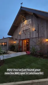 A promotional video showcasing the new Hickory's Smokehouse in Letchworth, highlighting its family-friendly amenities like a movie room and outdoor play area, alongside the bar and dessert station.