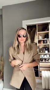 Here are a few options for your SEO alt text, keeping them under 125 characters:

**Option 1 (Descriptive & SEO-focused):**
Woman wearing an oversized blazer, white top, and jeans with casual shoes and a handbag, styled for a chic everyday look.

**Option 2 (Action-oriented):**
Stylish woman posing in an oversized blazer and jeans outfit, featuring Celine sunglasses and a designer handbag.

**Option 3 (Concise):**
Chic fashion outfit featuring an oversized blazer, straight-leg jeans, and comfortable shoes for a balanced style. 

**SEO Tip:** I recommend including the brands in the alt text if you want to rank for those specific searches (e.g., "Woman wearing AllSaints jeans and a Source Unknown blazer").
