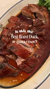A short, engaging video review of The Eight in London's Chinatown, focusing on their signature roast duck and other Cantonese dishes. The video uses quick, handheld shots to showcase the food's texture and the restaurant's cozy, casual atmosphere.