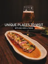 A promotional image for a restaurant featuring a plate of beef tataki in the foreground and a glass of beer in the background, with text overlay suggesting it as a venue for families with teenagers.