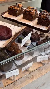A short, aesthetic video showcasing the interior, coffee, and pastries of Mulliri coffee shop in South Kensington. The video uses slow, cinematic pans and close-ups to highlight the shop's design and products, creating a cozy and inviting atmosphere.