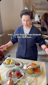 A creator visits Cafe Begum in Manchester to review their new brunch menu, showcasing dishes like a Full English breakfast, salmon eggs benedict, berry French toast, and an acai bowl. The video features a mix of talking-head segments and close-up shots of the food and venue interior.