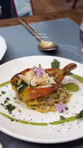 A montage video showcasing the interior decor and various dishes at Vatavaran in Knightsbridge. The video highlights the restaurant's aesthetic, cocktails, starters, mains, and desserts.
