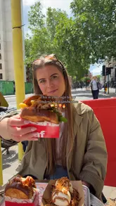 A fast-paced, engaging review of Loaf in Farringdon, London. The video features the creator trying various brioche sandwiches, fries, drinks, and a Biscoff French toast dessert. It uses quick cuts and on-screen text to highlight the menu items and the overall experience, effectively positioning the venue as a viral, must-try spot.