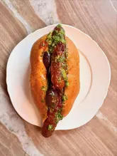 £5 lunch: London cheap eats! 

Hidden behind London’s bustling @regentstreetw1 is @oula.london inside @ibraazlondon a female run Tunisian café @boutheina.b.salem 

Their £5 Merguez bun, 3 spicy lamb sausages and Ojja within a pillow soft brioche roll was perfection! All cakes are homemade, definite reason for me to come by again soon. 

The gorgeous terracotta and Rouge interiors mixed with the intoxicating smells of North Africa makes the perfect setting to watch the world go by. 

Follow @ilovecakeandtea for more food adventures. 

NOT AN INVITE