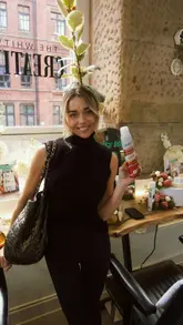 A creator documents her visit to a Batiste hair salon takeover event, showcasing the hair styling services, branded drinks, and product displays.