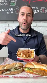 Here are a few options for your alt text, depending on what is most important for your SEO:

**Option 1 (Descriptive & SEO-focused):**
"Close-up of a new KFC garlic parmesan fried chicken sandwich served in a branded KFC box." (88 characters)

**Option 2 (Action-oriented):**
"A delicious new KFC garlic parmesan chicken sandwich on a toasted bun from the KFC UK menu." (89 characters)

**Option 3 (Concise):**
"New KFC UK menu item featuring a crispy garlic parmesan fried chicken sandwich." (79 characters)

**Tip:** Including "KFC," "fried chicken," and "sandwich" is great for search rankings, as these are the high-volume keywords users are likely to search for.
