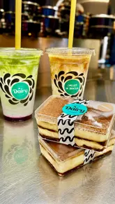A short, snappy promotional video showcasing the preparation of iced drinks and a tiramisu dessert at Llanfaes Dairy.