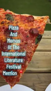 Here are a few options for your SEO alt text, keeping it under 125 characters:

*   **Option 1 (Descriptive):** Delicious NY-style pizza slices from Paddy’s Pizza & Bro’s Dumplings at the International Literature Festival Dublin.
*   **Option 2 (Action-focused):** People enjoying NY-style pizza from Paddy’s Pizza & Bro’s Dumplings at the Merrion Square Literature Festival.
*   **Option 3 (Concise):** NY-style pizza slices served at the International Literature Festival Dublin in Merrion Square.

**SEO Tip:** Option 1 is likely your best bet as it includes the specific brand names and the event name, which are high-value keywords for search engines.