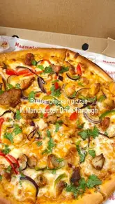 A short, fast-paced video showcasing a takeaway spot called Naanwich Club in Manchester, featuring butter chicken pizzas, naan wraps, masala fries, and samosas.